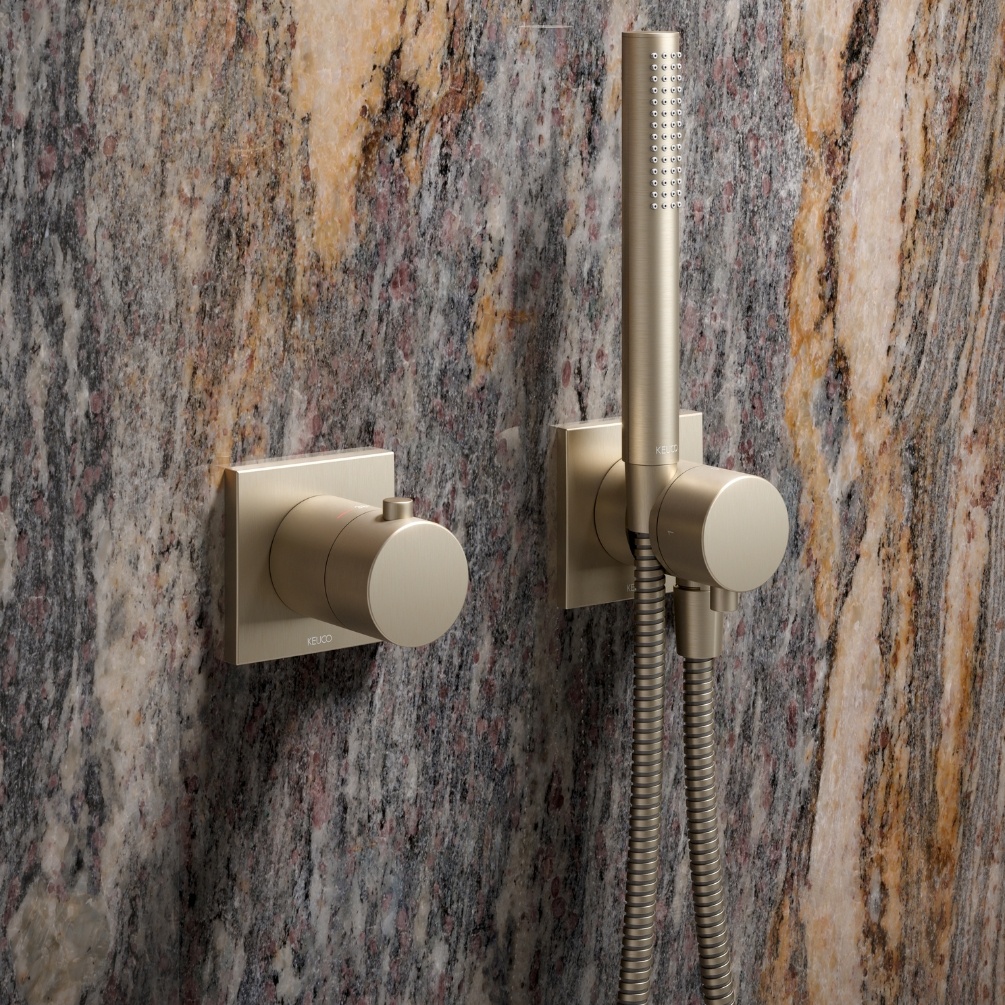 Product Lifestyle image of the Keuco IXMO Brushed Bronze Square Thermostatic Mixer 59553 030002 paired with a handset shower